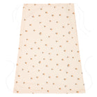 Der Sonnensegel Musselin Kirschen von KraftKids ist mit einem kleinen orange-grünen Blumenmuster auf beigefarbenem Grund versehen, besteht aus 100% Baumwolle und hat lange weiße Taillenbänder auf jeder Seite.