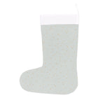 Die KraftKids Weihnachtssocke Musselin mit goldenen Punkten auf Grün, ideal als Weihnachtsdeko, wird auf weißem Hintergrund präsentiert.